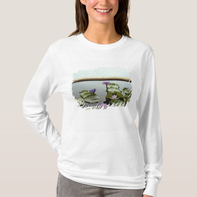 Water lilies in pond by ocean T-Shirt (Front)