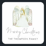 Watercolor Angel Merry Christmas Script  Square Sticker<br><div class="desc">Watercolor Angel Merry Christmas Script.  A beautiful Angel and windows scene,  and Merry Christmas in an elegant set handwriting style script Easily personalise your name.</div>