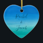 Watercolor Beach Wedding Couple Ceramic Tree Decoration<br><div class="desc">This beachy wedding design features a background of deep blues and greens with space on the front for the couple's names and the wedding date on the back. Click the customise button for more flexibility in modifying the text! Variations of this design as well as coordinating products are available in...</div>