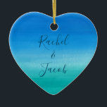 Watercolor Beach Wedding Couple Ceramic Tree Decoration<br><div class="desc">This beachy wedding design features a background of deep blues and greens with space on the front for the couple's names and the wedding date on the back. Click the customise button for more flexibility in modifying the text! Variations of this design as well as coordinating products are available in...</div>