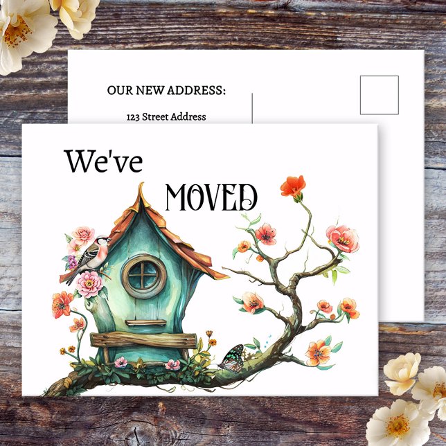 Watercolor Bird House New Address Announcement Postcard (We've moved new address announcement postcard featuring a watercolor bird house with flowers.)