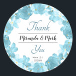 Watercolor Blue Floral Wreath Wedding Thank You Classic Round Sticker<br><div class="desc">Elegant watercolor blue floral wreath frame with a lovely Thank You script.
Gentle blue flowers watercolor art perfect to say Thank you for your special day.
Easy to personalise by changing the names and the date.</div>