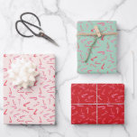 Watercolor Candy Cane Christmas  Wrapping Paper Sheet<br><div class="desc">This charming and festive Christmas wrapping paper features watercolor illustrations of candy canes in on mint green,  blush pink,  and candy cane red backgrounds.</div>