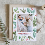 Watercolor Christmas Foliage & Holly Frame Photo Holiday Card<br><div class="desc">Happy holidays! Send holiday wishes to family and friends with this greenery holiday card. It features watercolor illustration of hollies,  pine needles and eucalyptus and evergreen with classic typography. Personalize by featuring your favorite photo and adding names and message. Matching items are available.</div>