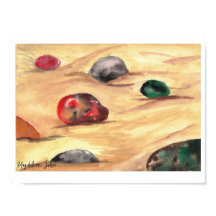 Watercolor colourful pebbles on a sandy beach