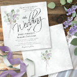 Watercolor Eucalyptus & Lavender Bouquet Wedding Invitation<br><div class="desc">These beautiful wedding invitations feature a hand painted watercolor design with a bouquet of eucalyptus leaves and sprigs of lavender flowers tied with a white bow. The rustic yet elegant design features fancy script lettering and formal wording on a marbled pale steel blue background. Beautiful way to invite your friends...</div>
