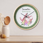 Watercolor Floral Teapot Custom Name Kitchen Round Clock<br><div class="desc">Rustic kitchen clock to personalise. Elegant watercolor teapot and flowers  illustration adds a country style look.</div>