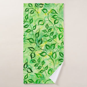 Watercolor green leaves on a yellow-green backgrou bath towel