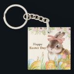 Watercolor Happy Easter Day Floral Bunny with Bow Key Ring<br><div class="desc">Celebrate the joy of Easter with this elegant watercolor illustration — a sweet brown-and-white bunny wearing a soft pink bow, nestled among vibrantly painted eggs in a woven basket, all framed by delicate pink peonies, greenery, and wildflowers. The warm, hand-painted aesthetic evokes vintage charm and heartfelt sincerity. Includes the tender...</div>
