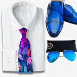 Watercolor Hawaiian pattern Blue Tie<br><div class="desc">The Blue Hawaiian print men's tie showcases a captivating array of colourful tropical leaves in its design. The tie's vibrant illustration captures the lush and exotic beauty of the Hawaiian islands, bringing a burst of tropical flair to any outfit. The leaves depicted on the tie feature a variety of bright...</div>