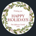 Watercolor Holly Leaves Wreath Christmas Holidays Classic Round Sticker<br><div class="desc">Lovely festive hand painted watercolor wreath holly in green and deep red berry colours.  Easy to edit  text.  HAPPY HOLIDAYS or MERRY CHRISTMAS & HAPPY NEW YEAR.  Makes great cards to send to family and friends during the holiday season - great keepsake!</div>