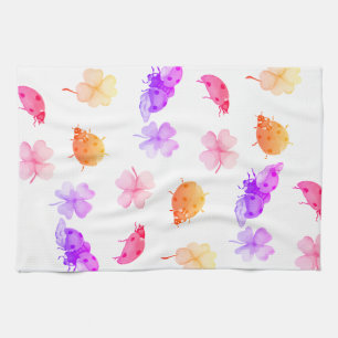 Watercolor ladybugs and four-leaf clovers tea towel