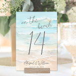 Watercolor On The Beach Wedding Table Number<br><div class="desc">Simple Seaside Watercolor Wedding Table Number Card. Bring a coastal touch to your wedding reception with this beach-themed table number card featuring a calming watercolor design in soft shades of blue and tan. The abstract shoreline artwork appears on both sides, making it easy to see from any angle. At the...</div>