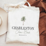 Watercolor Palm Destination Wedding Welcome Tote Bag<br><div class="desc">Welcome guests to your destination wedding with these chic and modern personalised tote bags. Design features a watercolor palm tree illustration with your wedding destination beneath (shown with Charleston) in classic serif lettering. Add your names beneath in dark green handwritten cursive script, as well as the year (shown in Roman...</div>