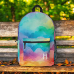 Watercolor Pastel Rainbow Clouds Monogram Printed Backpack<br><div class="desc">Brighten your child's day with the Watercolor Pastel Rainbow Clouds Monogram Printed Backpack. This charming backpack features a beautiful watercolor pastel rainbow design with fluffy clouds, customisable with your child's monogram for a personal touch. Made from durable materials, it includes spacious compartments and sturdy zippers, perfect for school, daycare, or...</div>