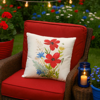 Watercolor Red and Blue Flowers on a White Cushion