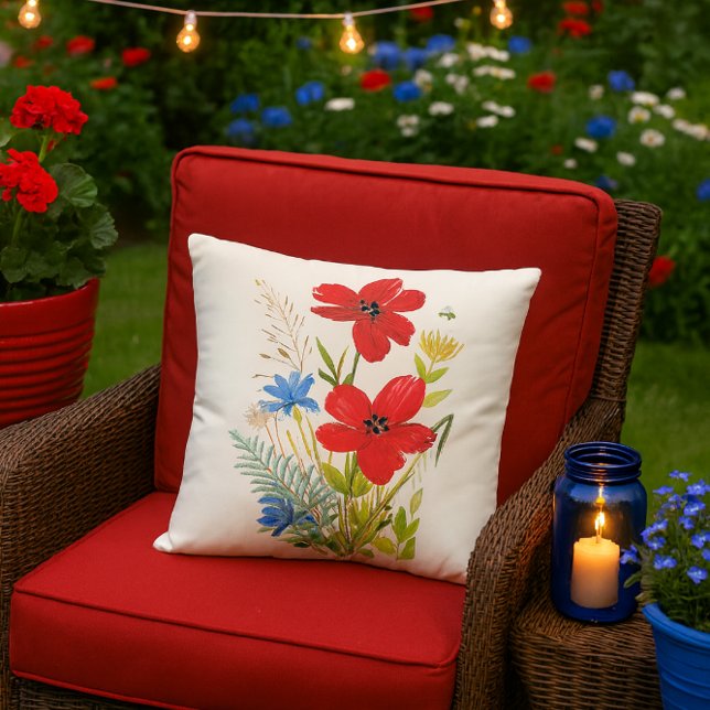 Watercolor Red and Blue Flowers on a White Cushion (festive summer patio mockup featuring the red poppy pillow and it’s bursting with charm.)