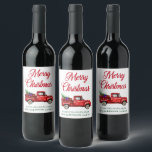 Watercolor Red Truck Christmas Tree String Lights Wine Label<br><div class="desc">A beautiful set of holiday wine bottle labels featuring modern calligraphy script "Merry Christmas" with a watercolor vintage red truck filled with gifts for everyone,  a Christmas tree and wrapped with string lights.</div>