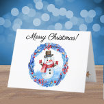 Watercolor Retro Snowman Wreath Merry Christmas Holiday Card<br><div class="desc">A fun, whimsical Merry Christmas winter card featuring a retro snowman framed inside a red berries, gold stars and blue leaves decorated wreath. Easily change the stylish script text on front, inside and back to make it yours using the Template provided. White envelope is included or mark "none" for reduced...</div>