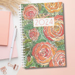 Watercolor Roses 2024 Monthly Planner<br><div class="desc">Stay organised in style with our non-dated Watercolor Roses 2024 Monthly Planner. This planner boasts a beautiful watercolor rose background in a soft pinks and coral, adding an elegant, artistic touch to your daily planning. The cover features a centred, bold, and modern "2024" that can be customised to fit the...</div>