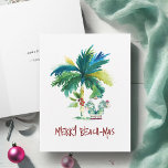 Watercolor Tropical Beach Folded Christmas Cards<br><div class="desc">These tropical beach folded Christmas cards feature an island-inspired exotic palm tree and cute holiday Santa. The words "Merry Beach-mas" are set in hand lettered type. The card opens to reveal a rich berry red colour. Use the template fields to add your personalised greeting. A charming yet funny choice to...</div>