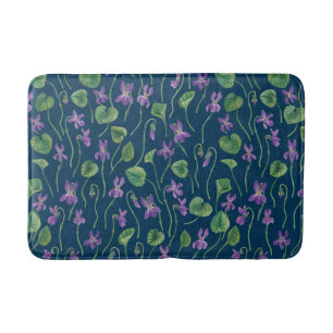 Watercolor violets on blue bath mat