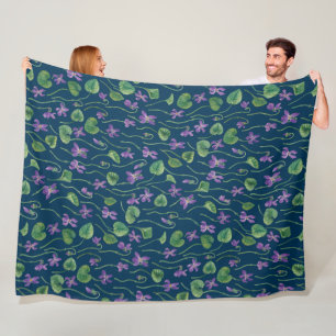 Watercolor violets on blue fleece blanket