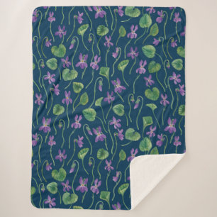 Watercolor violets on blue sherpa blanket