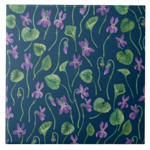 Watercolor violets on blue tile