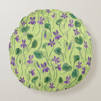 Watercolor violets on honey dew round cushion