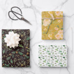 Watercolor Winter Pines Flowers and Christmas Tree Wrapping Paper Sheet<br><div class="desc">This pretty set of three wrapping papers includes Watercolor Pine: branches berries and pine leaves on black background; Watercolor Peach Florals on honey yellow background; and Watercolor Christmas Trees forest on white background. Matching ribbon available.</div>