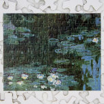 Waterlilies by Claude Monet, Vintage Fine Art Jigsaw Puzzle<br><div class="desc">Waterlilies by Claude Monet is a vintage impressionism fine art nature painting featuring waterlilies in a pond in Monet's garden at his home in Giverny, France. The weeping willow trees cast a reflection in the pond. Claude Monet enjoyed painting "en plein air" or "in the open air." A series of...</div>