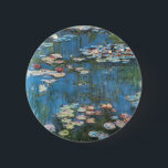 Waterlilies by Claude Monet, Vintage Impressionism 6 Cm Round Badge<br><div class="desc">Waterlilies (1914) by Claude Monet is a vintage impressionist fine art nature painting. One of many variations of water lily floral paintings that Monet painted by the pond in his flower garden in Giverny, France. About the artist: Claude Monet (1840-1926) was a founder of the French impressionist painting movement with...</div>