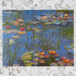 Waterlilies by Claude Monet, Vintage Nature Art Jigsaw Puzzle<br><div class="desc">Waterlilies by Claude Monet is a vintage impressionism fine art nature painting featuring waterlily flowers in a pond in Monet's garden at his home in Giverny, France. Beautiful flowers are floating in the water and green weeping willow trees are casting a reflection. Claude Monet enjoyed painting "en plein air" or...</div>