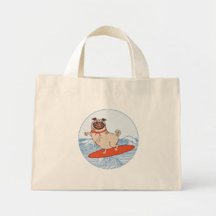 Wave riding happy pug dog on surfboard mini tote bag