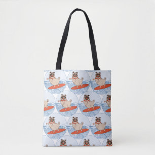 Wave riding happy pug dog on surfboard tote bag