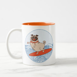 Wave riding happy pug dog on surfboard Two-Tone coffee mug