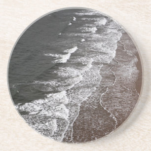 Waves breaking on a sandy beach coaster