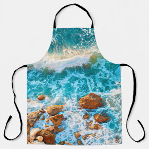 Waves on a rocky beach at sunset. Aerial viewbeach Apron