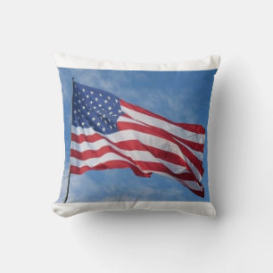 Waving American Flag Against Blue Sky Cushion