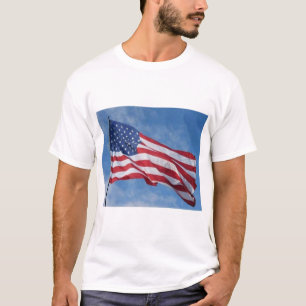 Waving American Flag Against Blue Sky T-Shirt