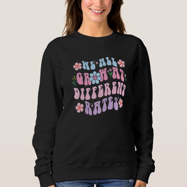 We All Grow At Different Rates SPED Teacher Groovy Sweatshirt (Front)