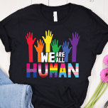 We are all human LGBTQ pride rainbow hands T-Shirt<br><div class="desc">A beautiful and colourful LGBTQ pride t-shirt featuring an illustration of rainbow-coloured hands with the quote "We are all human". With this gay pride awareness T-shirt,  you can spread some equality and show the world that you are a proud LGBTQ community member.</div>