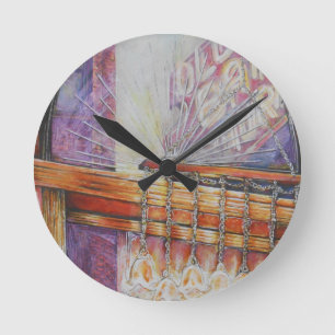 We Are All Moths Flying Around the Same Light. Round Clock