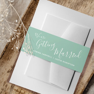 We are getting married muted green white wedding invitation belly band
