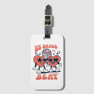 we dance to the same beat luggage tag