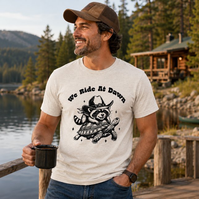 We Ride At Dawn Funny Racoon Tri-Blend Shirt (Creator Uploaded)