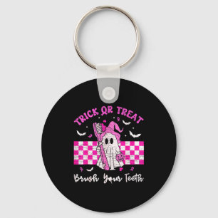 Wear a pink trick or treat brush teeth dental key ring