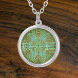 Weave Mandala Green and Orange Silver Plated Necklace<br><div class="desc">This funky mandala features green and orange in a basket weave style. Psychedelic visuals for the modern hippie or anyone who loves groovy colours.</div>