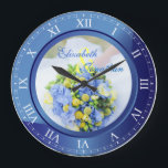 Wedding Anniversary Blue Sapphire Roman Numerals Large Clock<br><div class="desc">A lovely clock in blue sapphire tones, with Roman numerals. The frame that functions as part of the clock is also a frame for your favourite wedding photograph. Keep the sample image of blue, yellow and green Spring floral bouquet, or replace it with your own image for full personalisation. Add...</div>